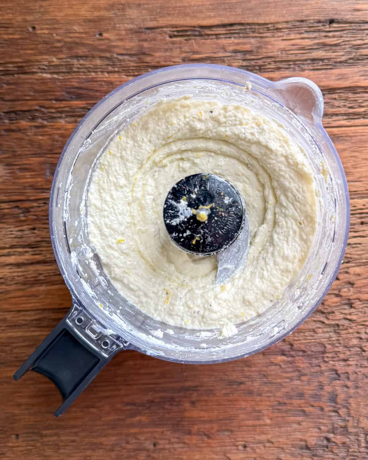 Whipped feta in a mini food processor.