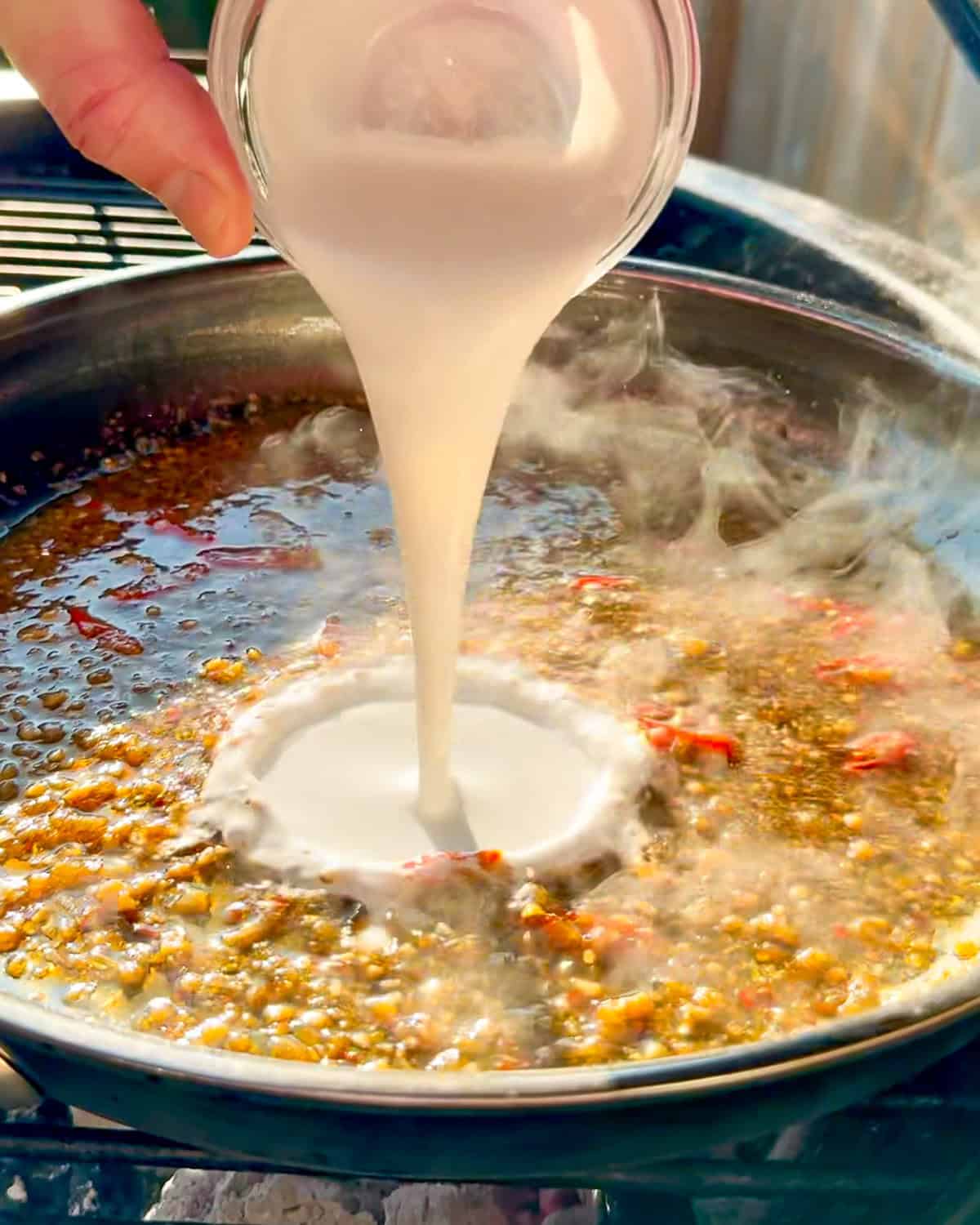 Add the coconut cream to the lemongrass sauce.