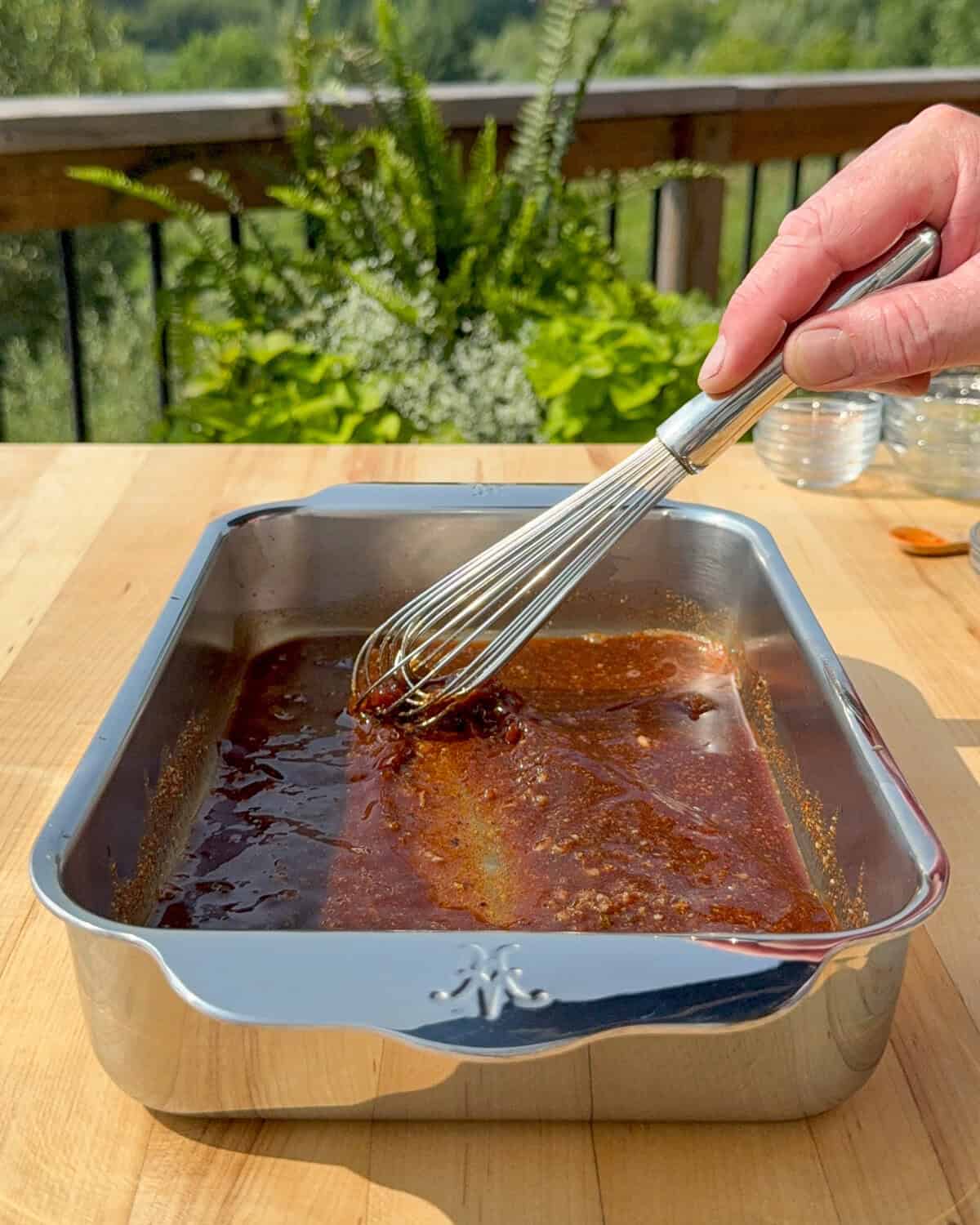 Wisk the marinade into a tray.