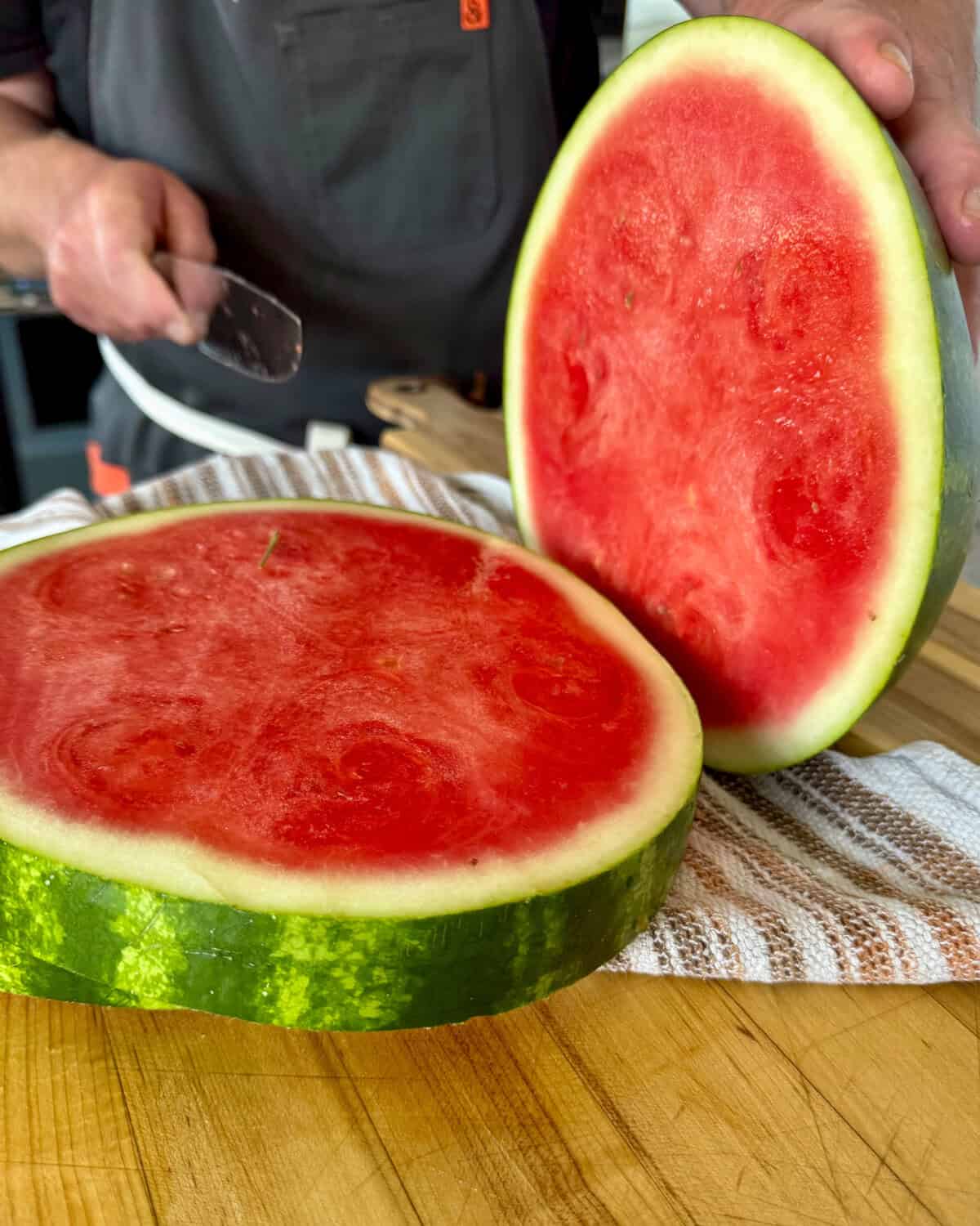 Cut the watermelon into slabs.