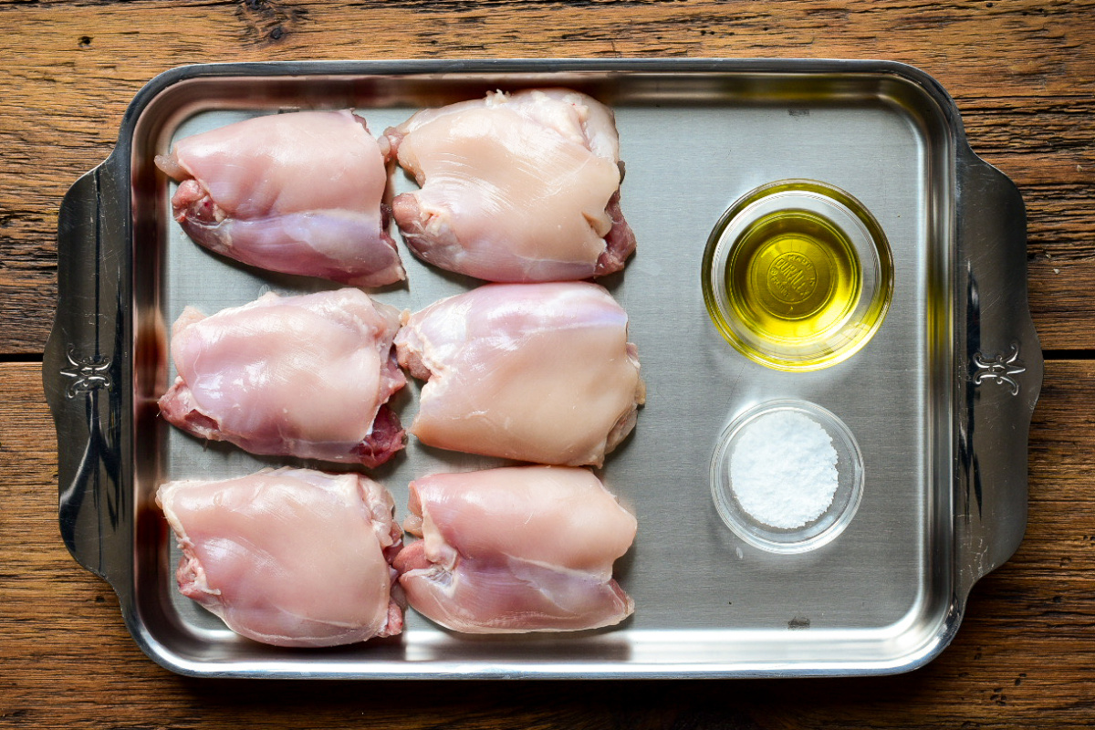 Chicken Ingredients for a zhoug chicken pasta salad with roasted vegetables.