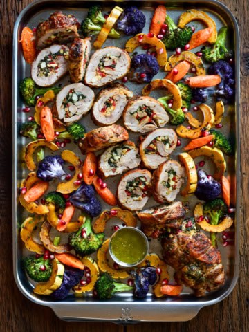 Stuffed rolled urkey thighs with spinach & feta, sliced and served with roasted vegetables.