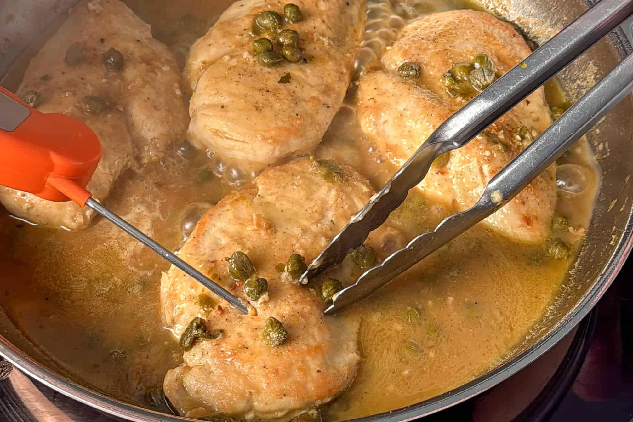 Simmer the chicken in the lemony picotta sauce until the internal temperature reaches 165°F (74°C).