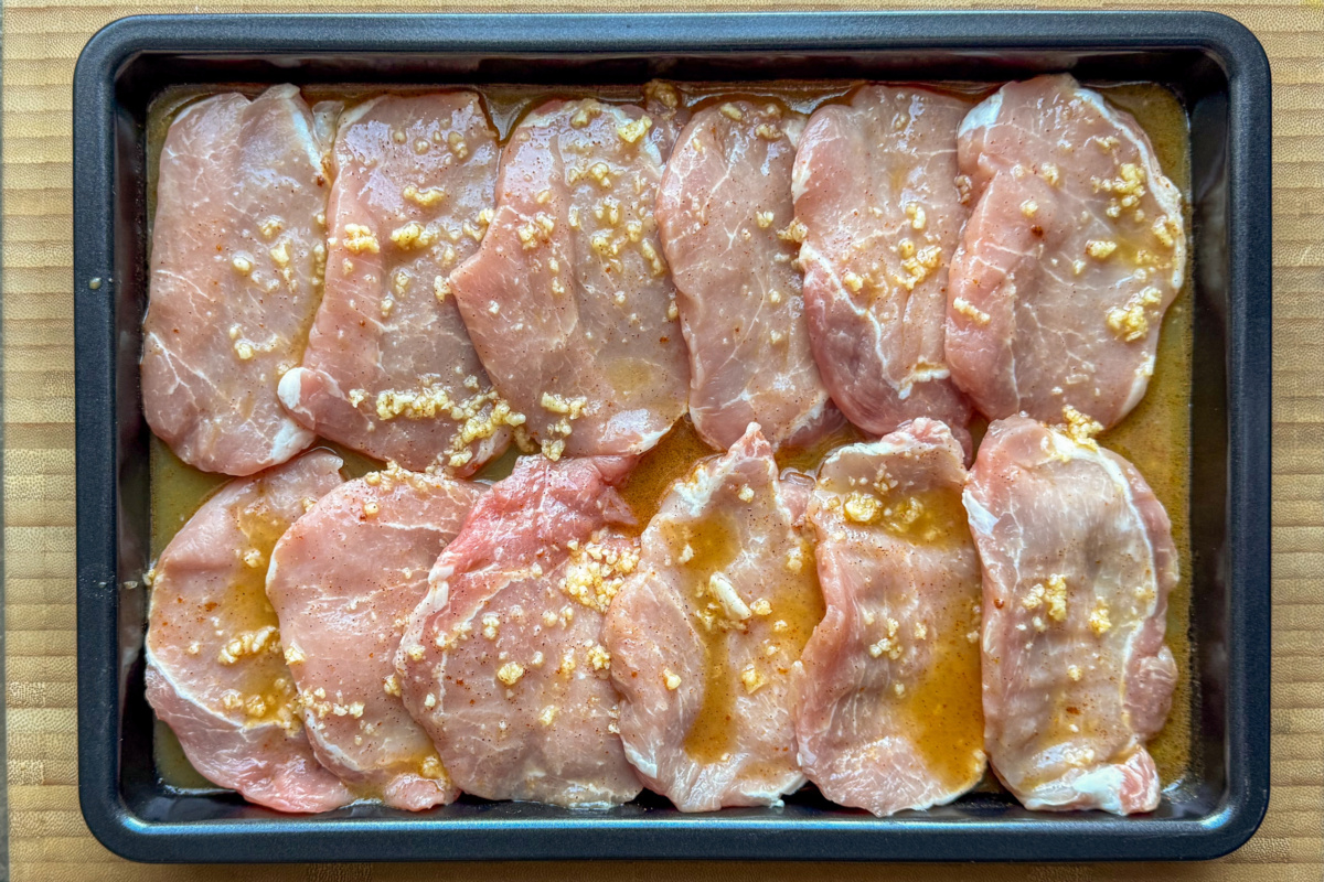 Citrus marinated pork on a tray.