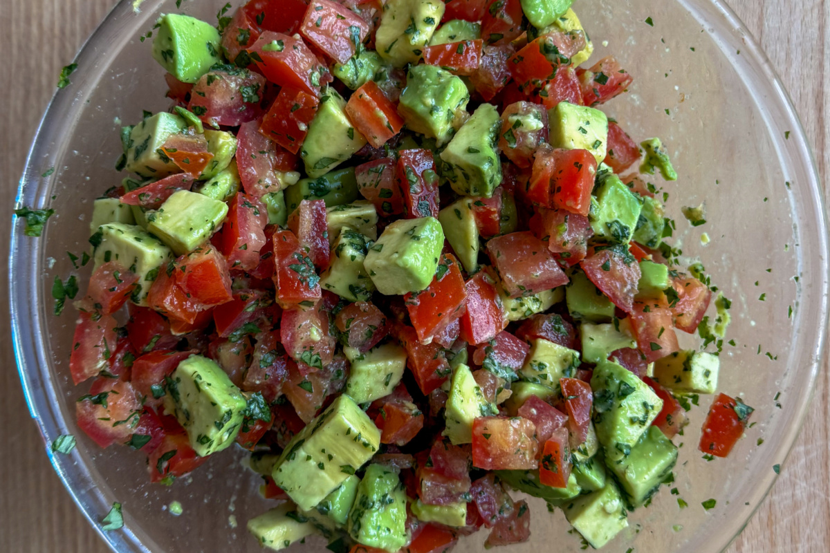 Gently fold together the salsa ingredients: tomatoes, diced avocado, cilantro, lime, and salt.