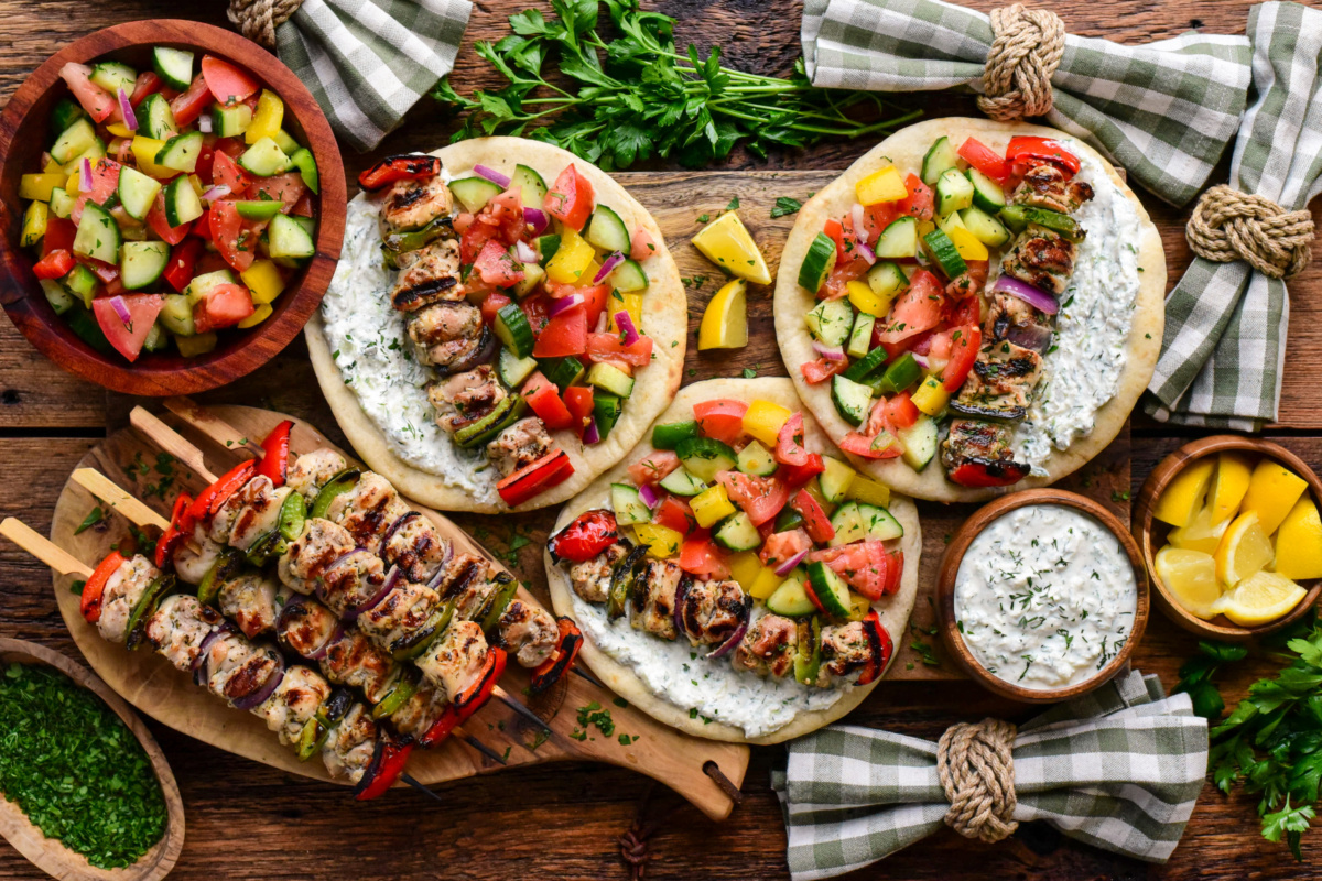Three loaded chicken pitas served with a creamy whipped feta tzatziki and a greenhouse salad.