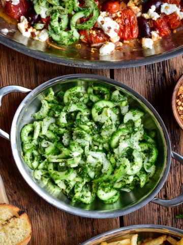 A crunchy cucumber and celery slaw with an herb dressing served in a mini au gratin.